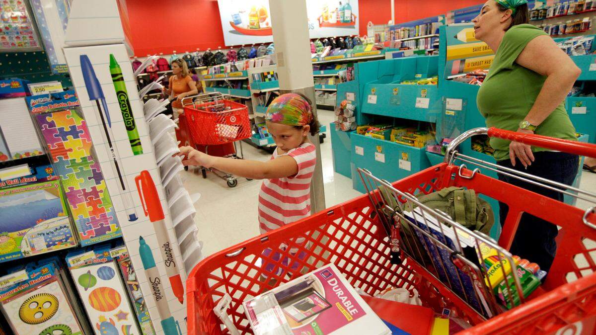 Hailey Durham, 8, shops with her mom Cher Durham for back-to-school items at Target in Garner on Friday, August 3, 2012. Friday was the start of North Carolinaa¬(R)¬¢,aa°¬(R)¬Æ,aa´¬(R)¬¢s annual sales tax holiday.