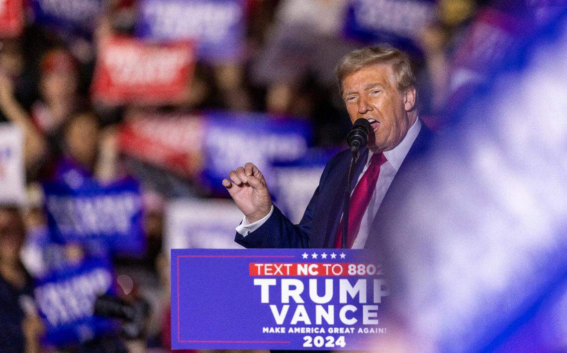 Former President Donald Trump speaks during a rally at Minges Coliseum in Greenville on Monday, Oct. 21, 2024. With two weeks until Election Day, Trump went on a three-city tour, in which Trump will also see the destruction caused by Hurricane Helene in Asheville and speak at a faith conference in Concord.