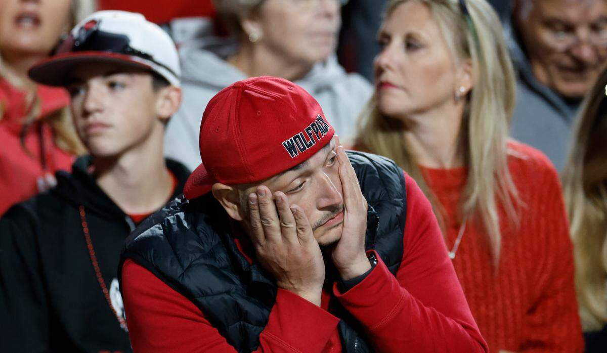 A Wolfpack fan reacts after Duke hit a field goal, putting them up by 10 in the second half of Duke’s 29-19 victory over N.C. State at Carter-Finley Stadium in Raleigh, N.C., Sat. Nov. 9, 2024.