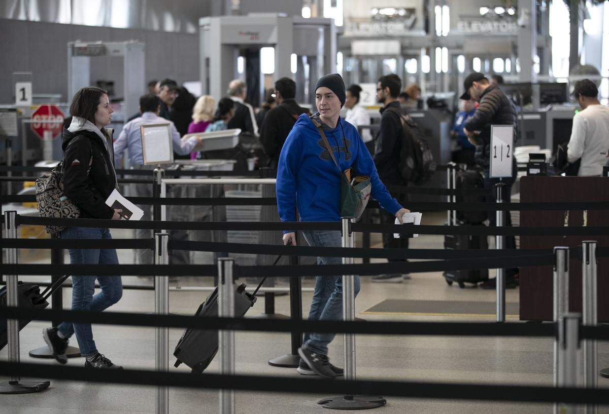 Travelers enter the Transportation Security Administration checkpoint at Raleigh-Durham International Airport’s Terminal 2 in March 2019.