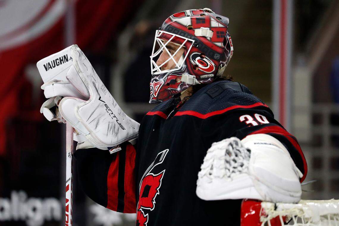 Carolina Hurricanes goaltender Alex Nedeljkovic (39) waits for a face-off against the Nashville Predators during the third period of an NHL hockey game in Raleigh, N.C., Tuesday, March 9, 2021. (AP Photo/Karl B DeBlaker)