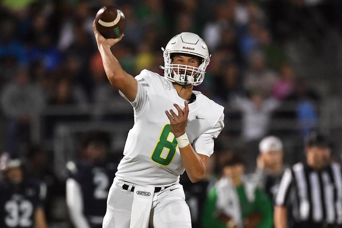 Cardinal Giobbons quarterback Whitt Newbauer launches the pass during the first half. The Leesville Road Pride and the Cardinal Gibbons Crusaders met in a football game in Raleigh, N.C. on October 7, 2022.