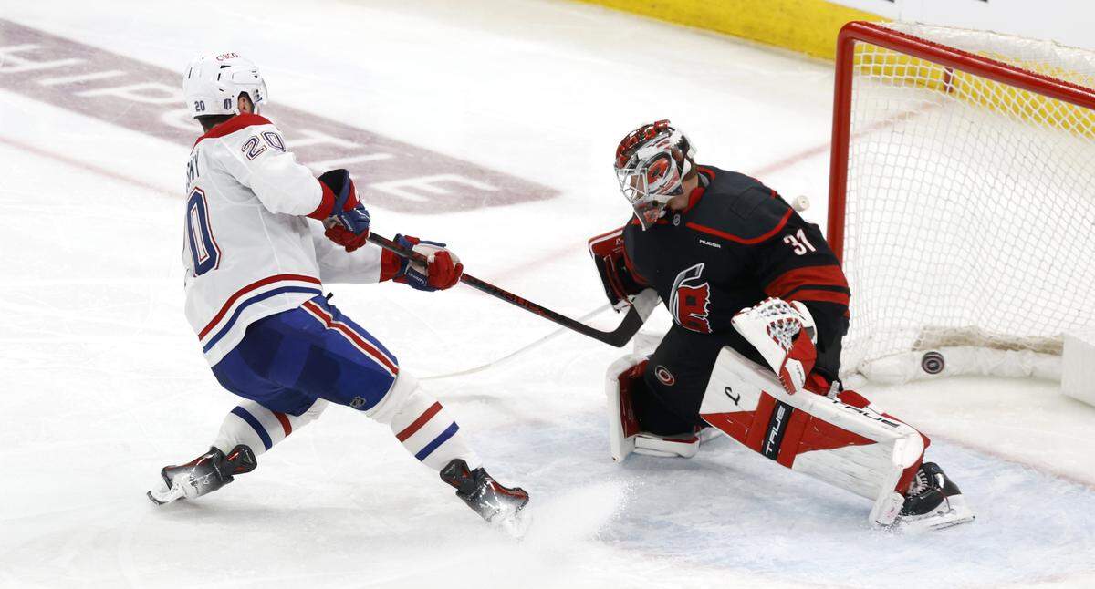 Montréal's Juraj Slafkovský (20) scores on Carolina's Frederik Andersen (31) in the third period of the Canadiens’ 6-2 victory over the Hurricanes in game one of the Eastern Conference Finals at the Lenovo Center Thursday, May, 21, 2026.