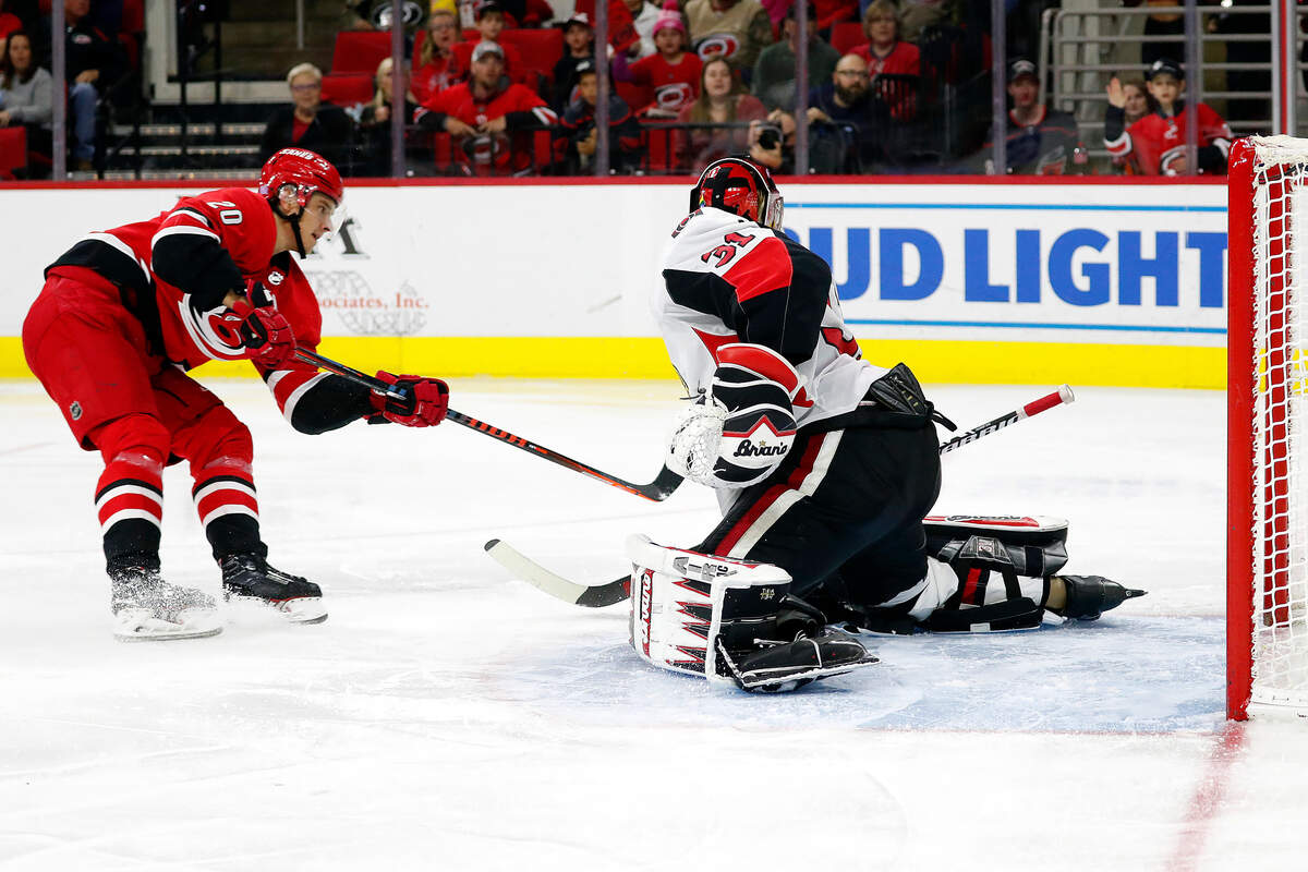 Carolina Hurricanes’ Sebastian Aho (20), of Finland, shoots the puck past Ottawa Senators goaltender Anders Nilsson (31) for a goal during the second period of an NHL hockey game in Raleigh, N.C., Monday, Nov. 11, 2019. (AP Photo/Karl B DeBlaker)
