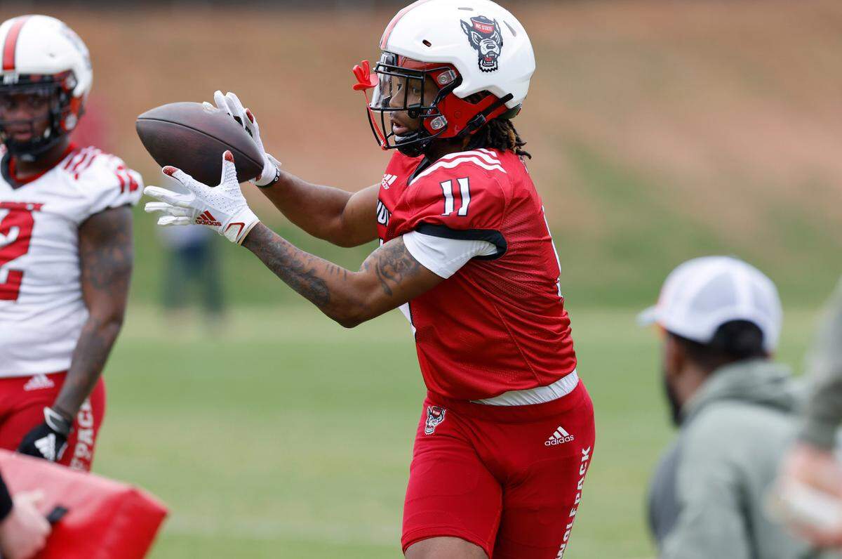 N.C. State tight end Juice Vereen (11) pulls in the pass during the Wolfpack’s first spring practice in Raleigh, N.C., Wednesday, March 1, 2023.