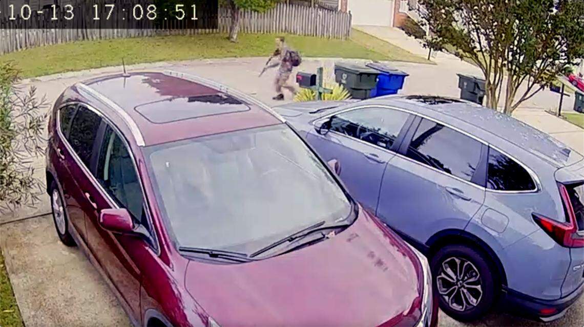 Austin Thompson is seen menacing his neighborhood in video footage taken on Oct. 13, 2022. It was displayed in court on Feb. 5, during his sentencing hearing. 