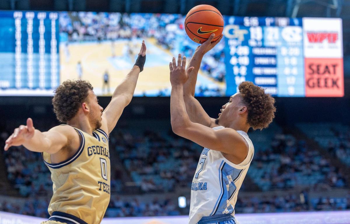 North Carolina guard Seth Trimble (7) puts up a shot against Georgia Tech’s Lance Terry (0) in the first half on Saturday, December 7, 2024 at the Smith Center in Chapel Hill, N.C