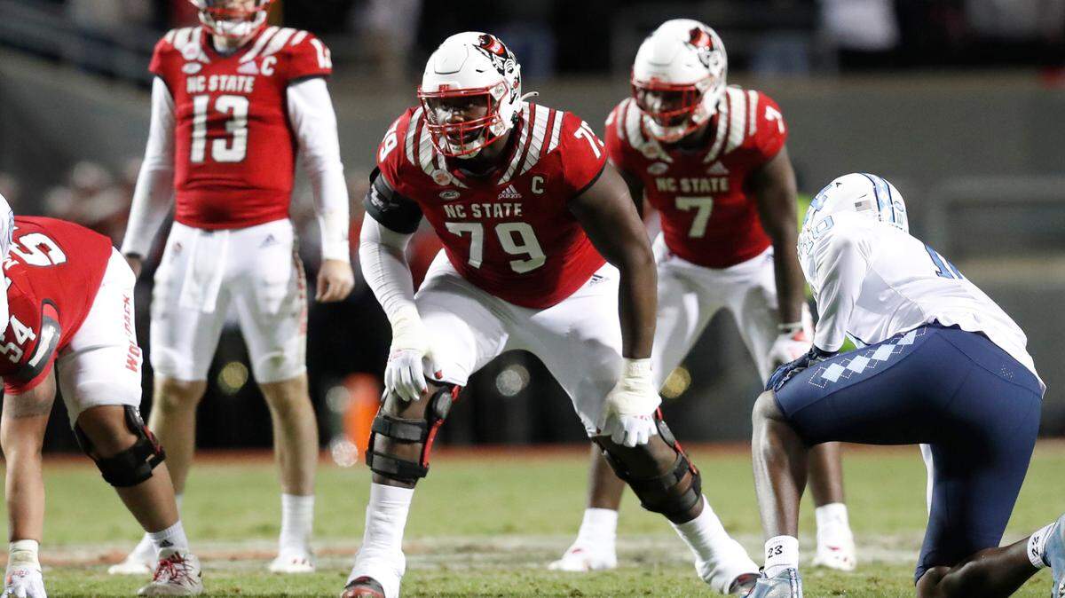 N.C. State offensive tackle Ikem Ekwonu (79) lines up during N.C. State’s game against UNC at Carter-Finley Stadium in Raleigh, N.C., Friday, November 26, 2021.