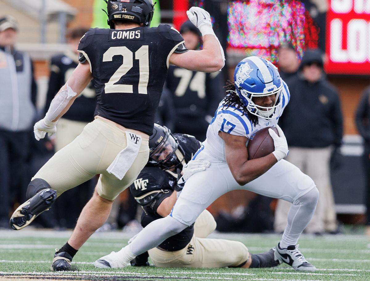 Duke’s Star Thomas runs the ball during the second half of the Blue Devils’ 23-17 win over Wake Forest at Allegacy Stadium on Saturday, Nov. 30, 2024, in Winston-Salem, N.C.