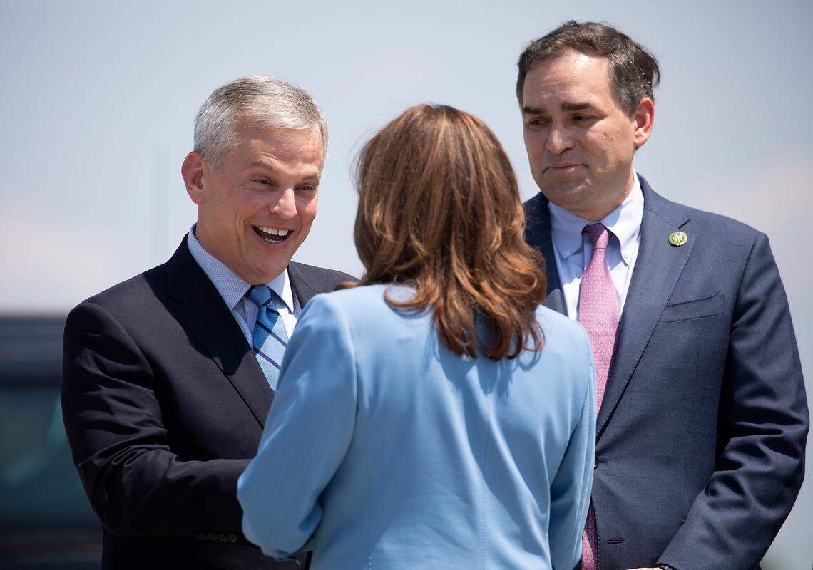North Carolina Attorney General Josh Stein greets Vice President Kamala Harris as Congressman Wiley Nickel looks on, Friday, August. 16, 2024.
