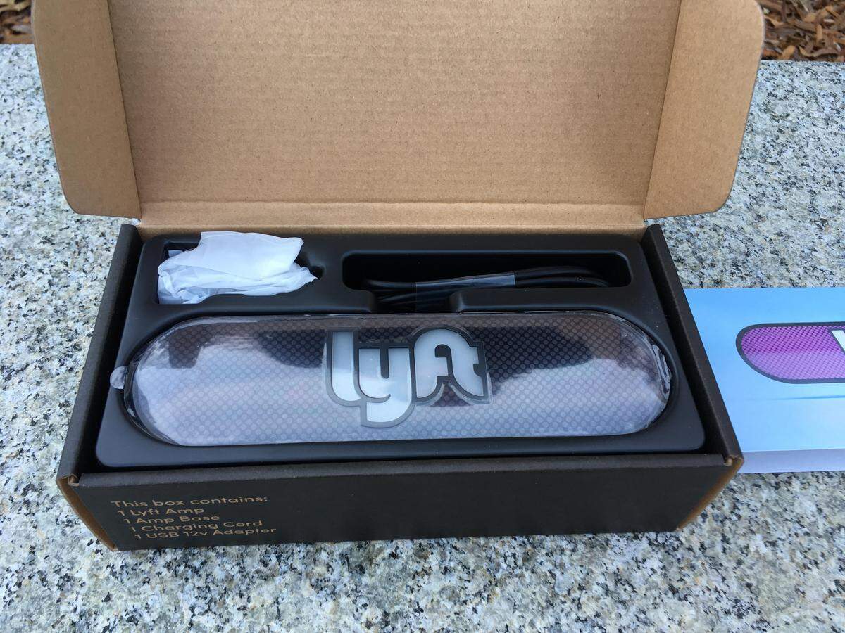 Nearly 500 Lyft drivers received an Amp like this one at an event in downtown Raleigh on Tuesday. The Amp, which can be placed on a car’s dashboard, lights up in different colors to help customers using the company’s app find their ride.