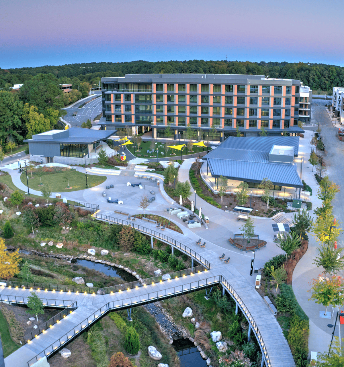 Built “on spec” with no tenants lined up before construction, Horseshoe is a trio of buildings wrapped around a courtyard inside Boxyard RTP’s 100-acre district.