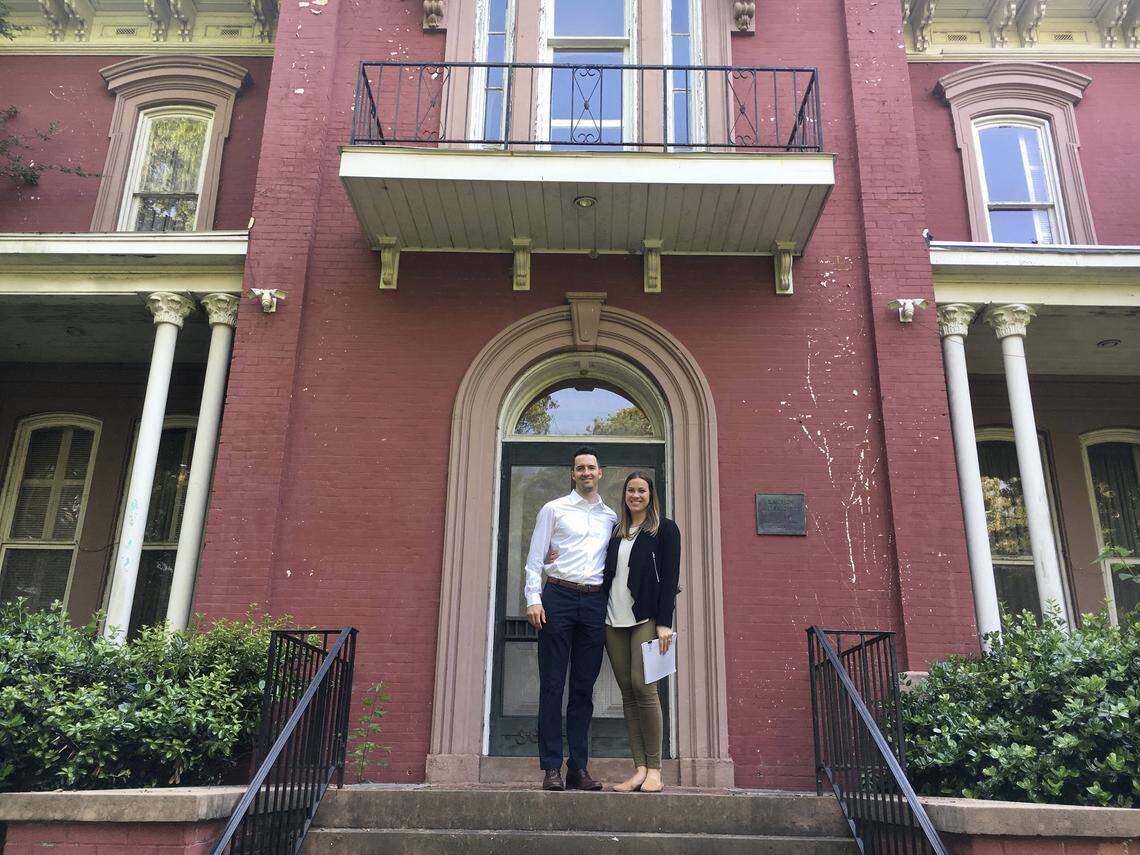 Jeff and Sarah Shepherd standing in front of Montford Hall.