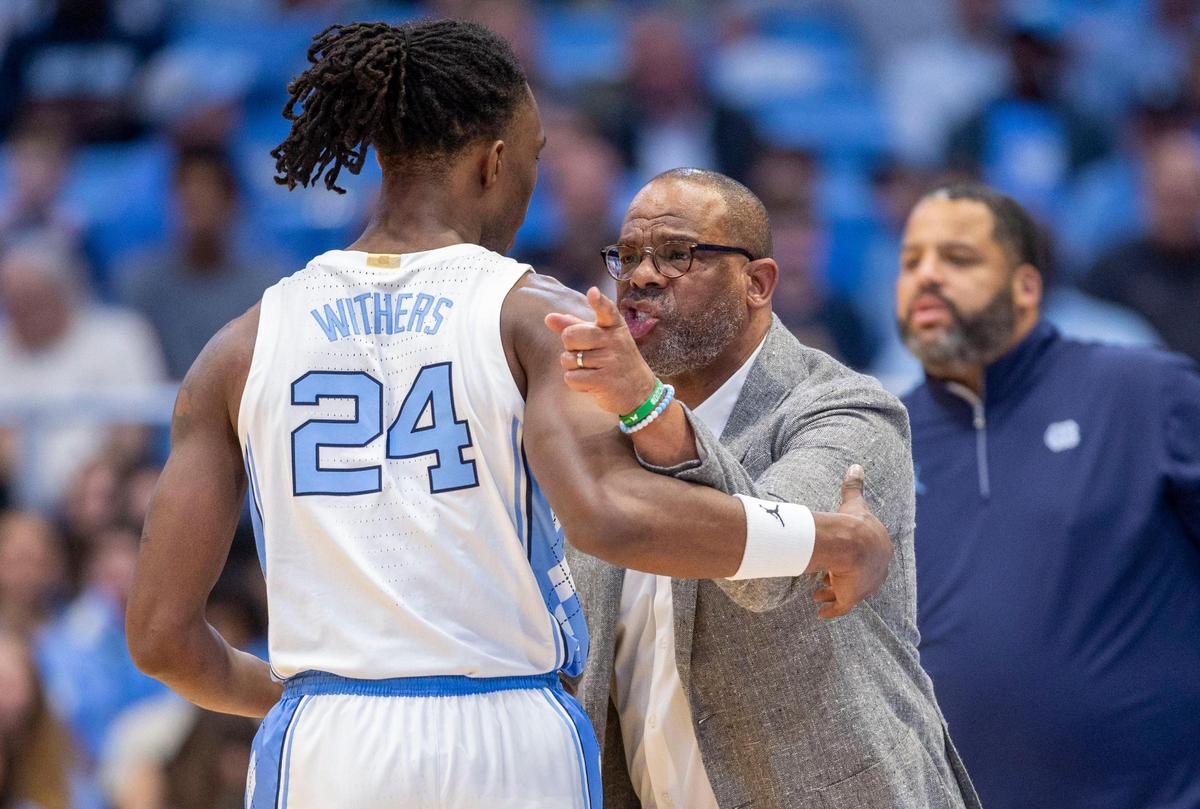 North Carolina coach Hubert Davis directs Jae’Lyn Withers (24) during the first half against Elon on Monday, November 4, 2024 at the Smith Center in Chapel Hill, N.C.