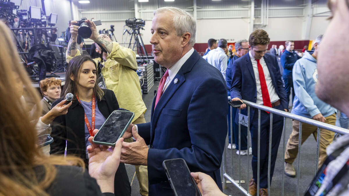 Former Republican National Committee chair and U.S. Senate Republican primary candidate Michael Whatley talks with reporters before a rally featuring President Donald Trump at the Rocky Mount Event Center in Rocky Mount on Friday, Dec. 19, 2025. Whatley was endorsed by Trump in July.