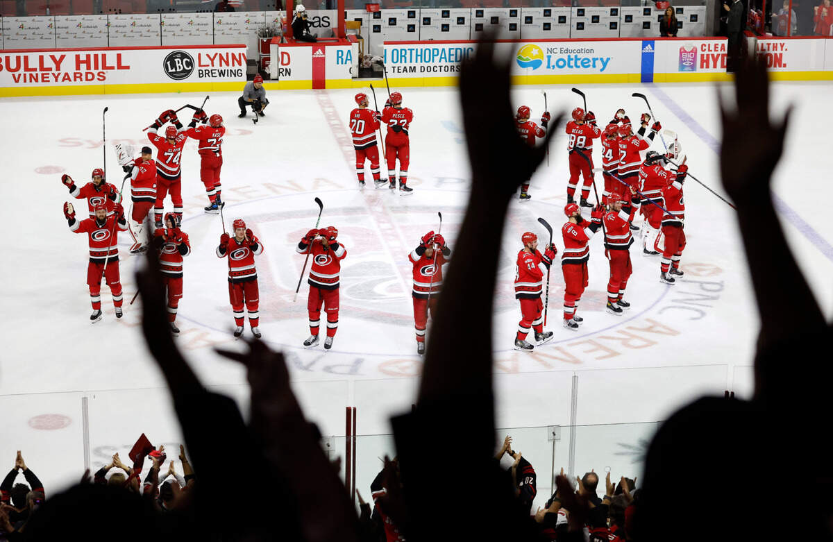 Fans celebrates with Carolina during the Storm Surge after the Hurricanes’ 4-1 victory over the Columbus Blue Jackets at PNC Arena in Raleigh, N.C., Wednesday, Oct. 12, 2022.