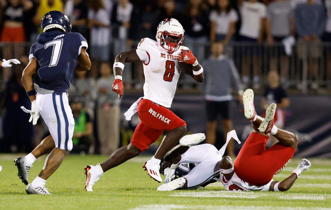 N.C. State’s Julian Gray (8) returns a kickoff during the second half of N.C. State’s 24-14 victory over UConn at Rentschler Field in East Hartford, Conn. Thursday, August 31, 2023.