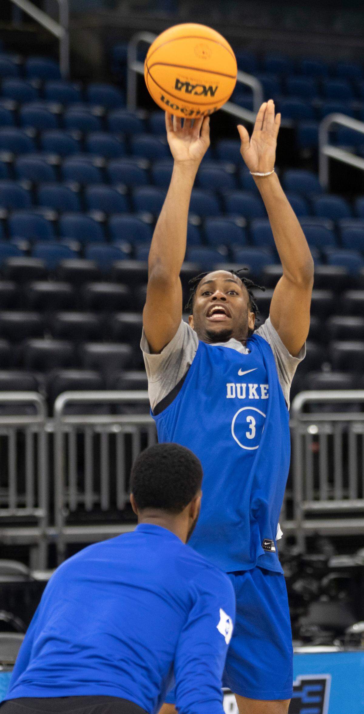 Duke’s Jeremy Roach (3) shoots over assistant coach Amile Jefferson during the Blue Devils’ practice on Wednesday, March 15, 2023 at the Amway Center in Orlando, Fla.