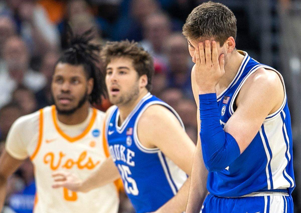 Duke’s Kyle Filipowski (30) reacts after being his in the eye in the first half against Tennessee during the second round of the NCAA Tournament on Saturday, March 18, 2023 at the Amway Center in Orlando, Fla