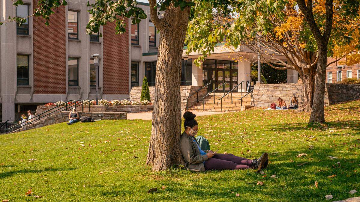 Students sit on the lawn at Appalachian State University in Boone, NC in October 2020.
