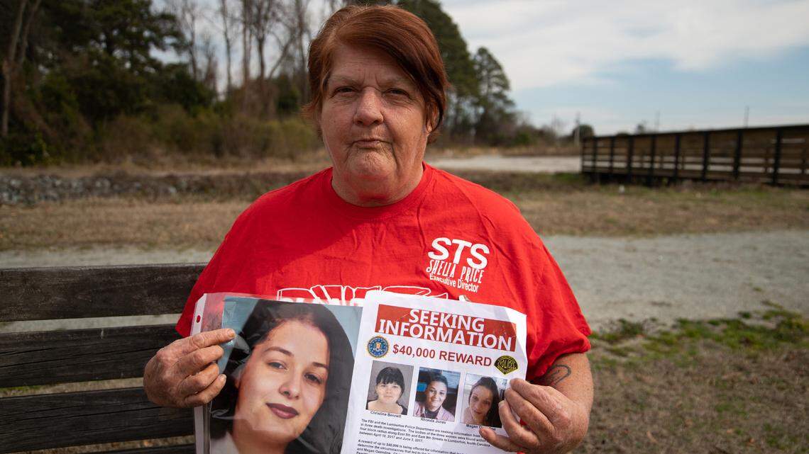 Shelia Price holds a photo of her daughter, Rhonda Jones, and her reward poster. Jones was a Lumbee woman whose body was found in a trash can in Robeson County. Her murder remains unsolved, and Price has founded the organization, Shatter the Silence, which holds rallies and marches and supports victims’ families.