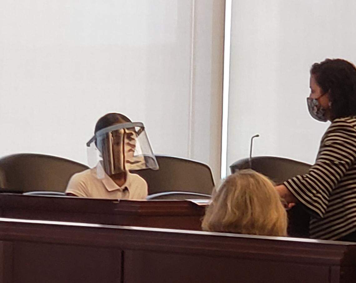 Marquise McCall, left, testifies on Wednesday, April 14, 2021 in the trial of Michael Buchanan, who is charged with killing McCall’s 21-month-old son Torrance Adams.