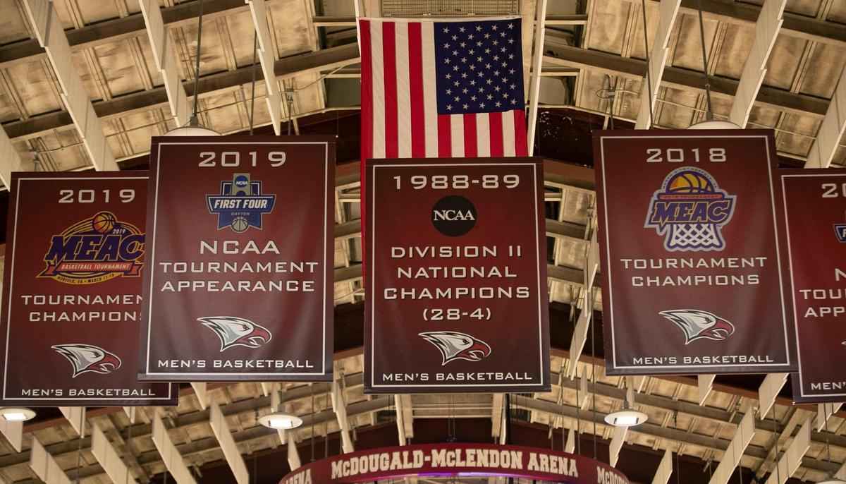 Banners from North Carolina Central University’s appearances in the NCAA Tournament from 2018 and 2019 hang at McDougald-Mclendon Arena in Durham. This season the team is 5-8, and has played only 13 games due to the COVID-19 pandemic.