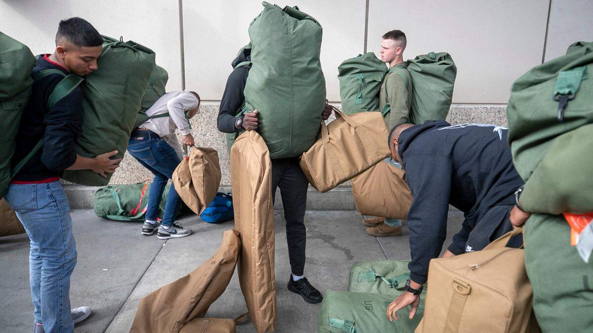 Nearly 150 Marines arrive at Raleigh-Durham International Airport to join the Thanksgiving travel rush on Tuesday, November 22, 2022 in Morrisville, N.C. The group has just completed training at Camp Geiger in Jacksonville, N.C.