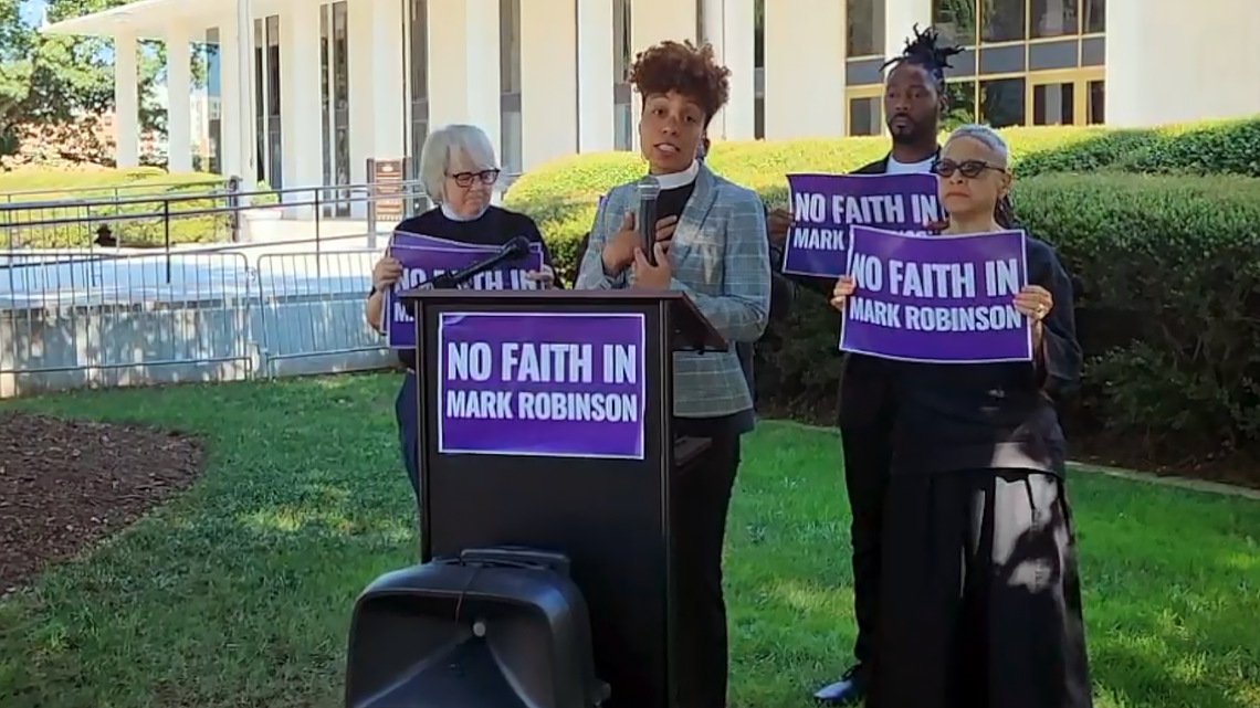 Rev. Chalice Overy, associate pastor of Pullen Memorial Baptist Church in Raleigh, talks about why she thinks Republican candidate for governor, Lt. Gov. Mark Robinson, “does not represent all Christians,” during a news conference Wednesday, Aug. 14, 2024, at the N.C. Legislative Building in downtown Raleigh.