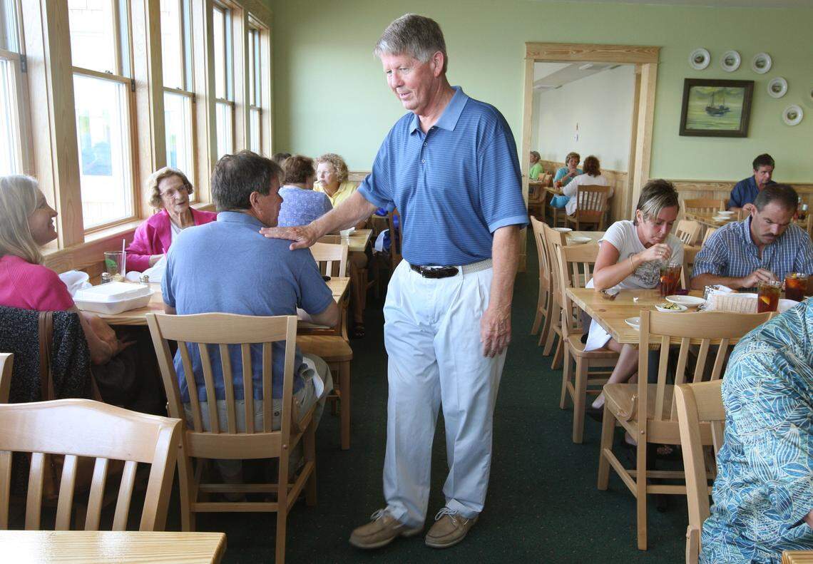 Sen. Marc Basnight greets diners at Basnight’s Lone Cedar Cafe in Nags Head Wednesday Aug. 29, 2007 as it opened for business after a devastating fire which burned the original building to the ground.