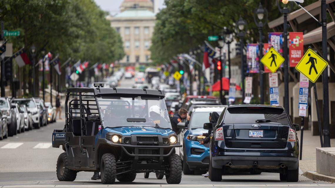 Raleigh Police officers use a utility terrain vehicle to assist with a traffic stop on Fayetteville Street on Wednesday, September 27, 2023 in Raleigh, N.C.