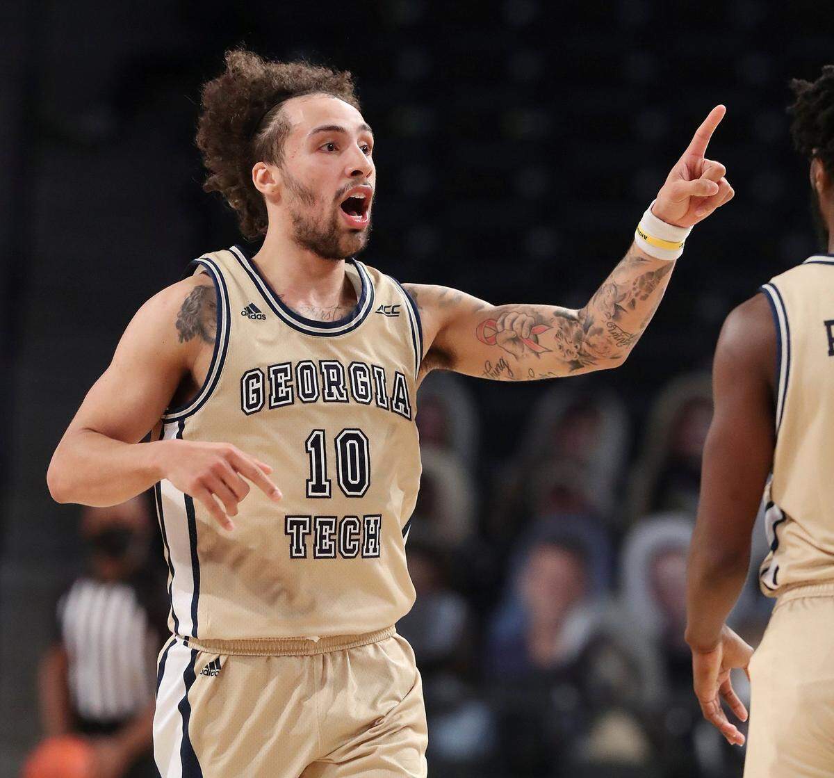 Georgia Tech guard Jose Alvarado reacts after hitting a three pointer against North Carolina during an NCAA college basketball game Wednesday, Dec. 30, 2020, in Atlanta.