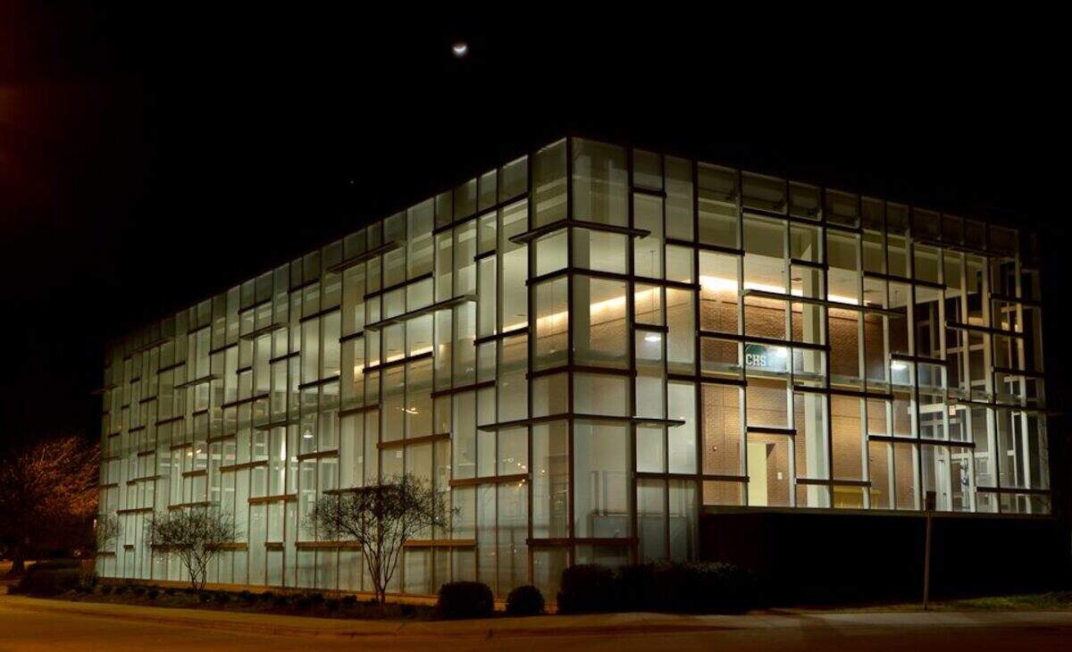 Photo of Cary High School at night. The Wake County school system plans to offer some in-person instruction this school year at Cary High for Crossroads FLEX students.