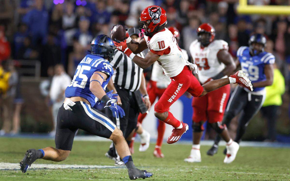 N.C. State wide receiver KC Concepcion (10) pulls in a reception during the second half of Duke’s 24-3 victory over N.C. State at Wallace Wade Stadium in Durham, N.C., Saturday, Oct. 14, 2023.