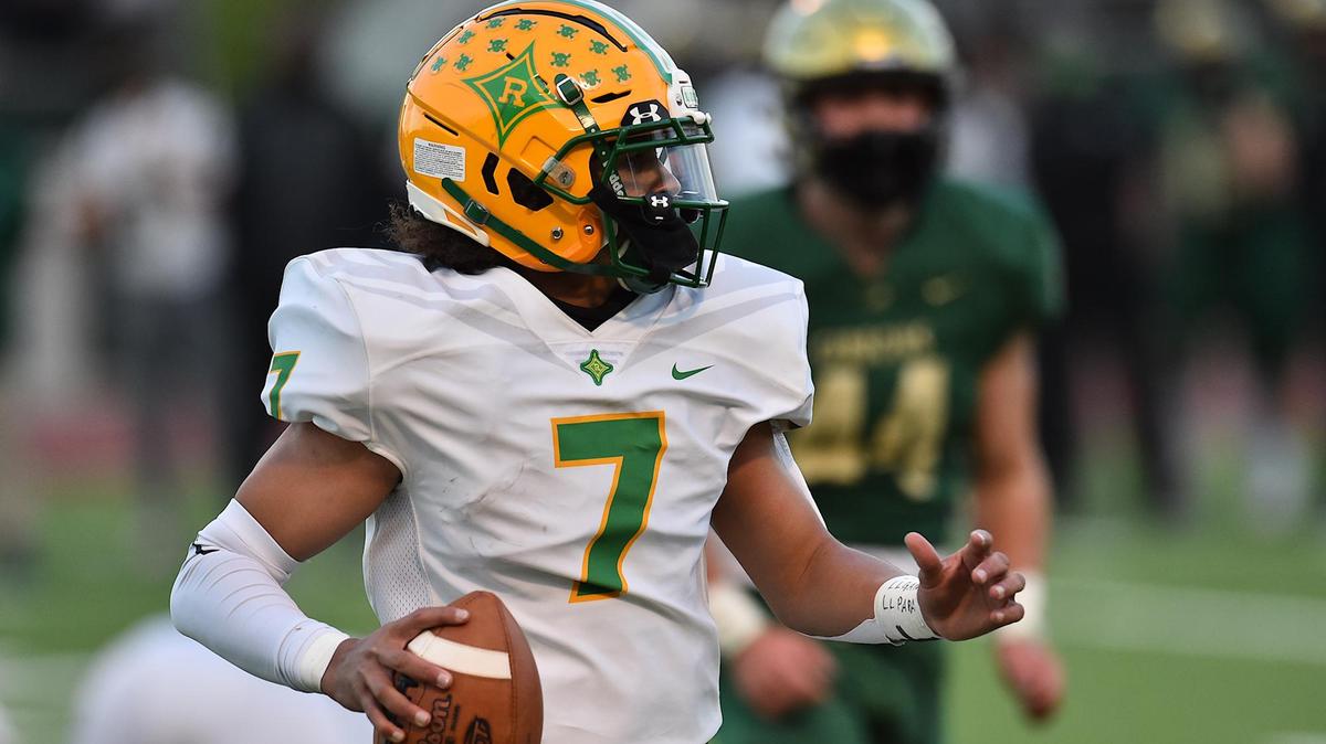 Richmond’s Kellan Hood (7) looks to pass during the first half. The Cardinal Gibbons Crusaders and the Richmond Raiders met in a NCHSAA 4A second round playoff game in Raleigh, N.C. on April 23, 2021.