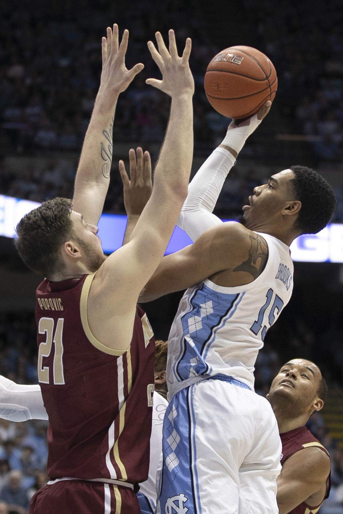 North Carolina’s Garrison Brooks (15) shoots over Boston College’s Nik Popovic (21) during the first half on Saturday, February 1, 2020 at the Smith Center in Chapel Hill, N.C.