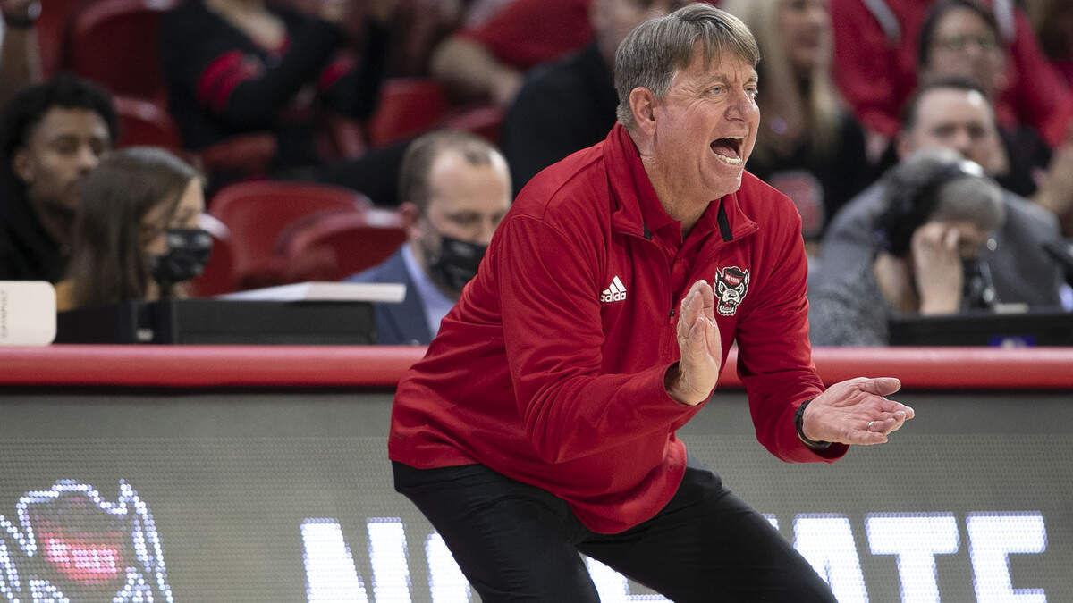 N.C. State coach Wes Moore applauds his team’s performance in the second half against Kansas State during the second round of the NCAA Tournament on Monday, March 21, 2022 at Reynolds Coliseum in Raleigh, N.C.
