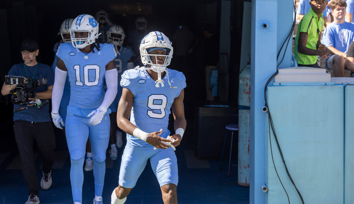 North Carolina wide receiver Devontez Walker (9) enters the playing field the Tar Heels’ game against Syracuse on Saturday, October 7, 2023 at Kenan Stadium in Chapel Hill, N.C. Walker was granted eligibility this week by the NCAA to play in his first game of the 2023 season for the Tar Heels.