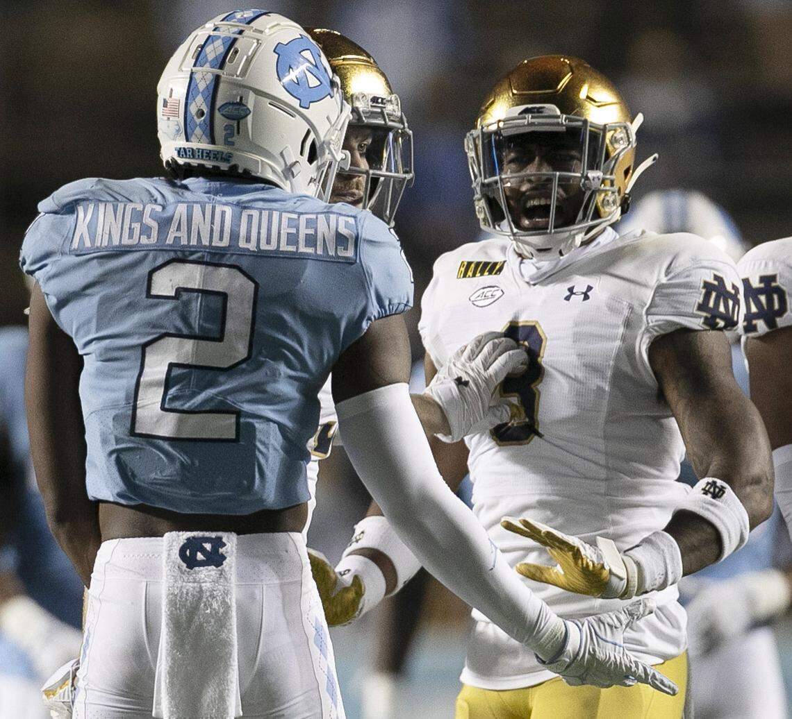 North Carolina’s Dyami Brown (2) and Notre Dame’s Houston Griffith (3) exchange words during the fourth quarter on Friday, November 27, 2020 at Kenan Stadium in Chapel Hill, N.C.