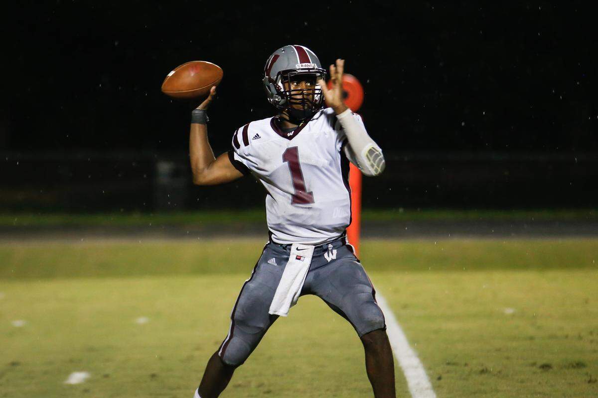 Wakefield quarterback Matt McKay (1) passes during game at Middle Creek on Aug. 19, 2016. Middle Creek won 53-7.