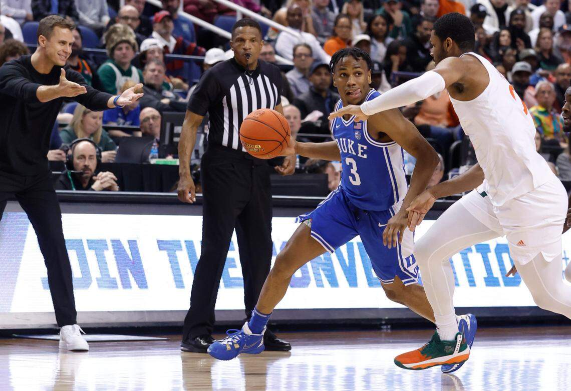 Duke’s Jeremy Roach (3) drives around Miami’s A.J. Casey (0) during the second half of Duke’s 85-78 victory over Miami in the semifinals of the ACC Men’s Basketball Tournament in Greensboro, N.C., Friday, March 10, 2023.