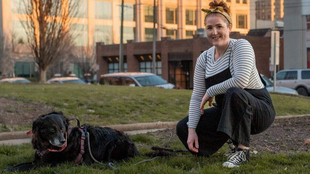 Amanda Buck of Raleigh, who is opening a new pet care business, Walks + Whiskers, is part of a rising trend of people starting new businesses in North Carolina and the nation. (B.Woods Photo)
