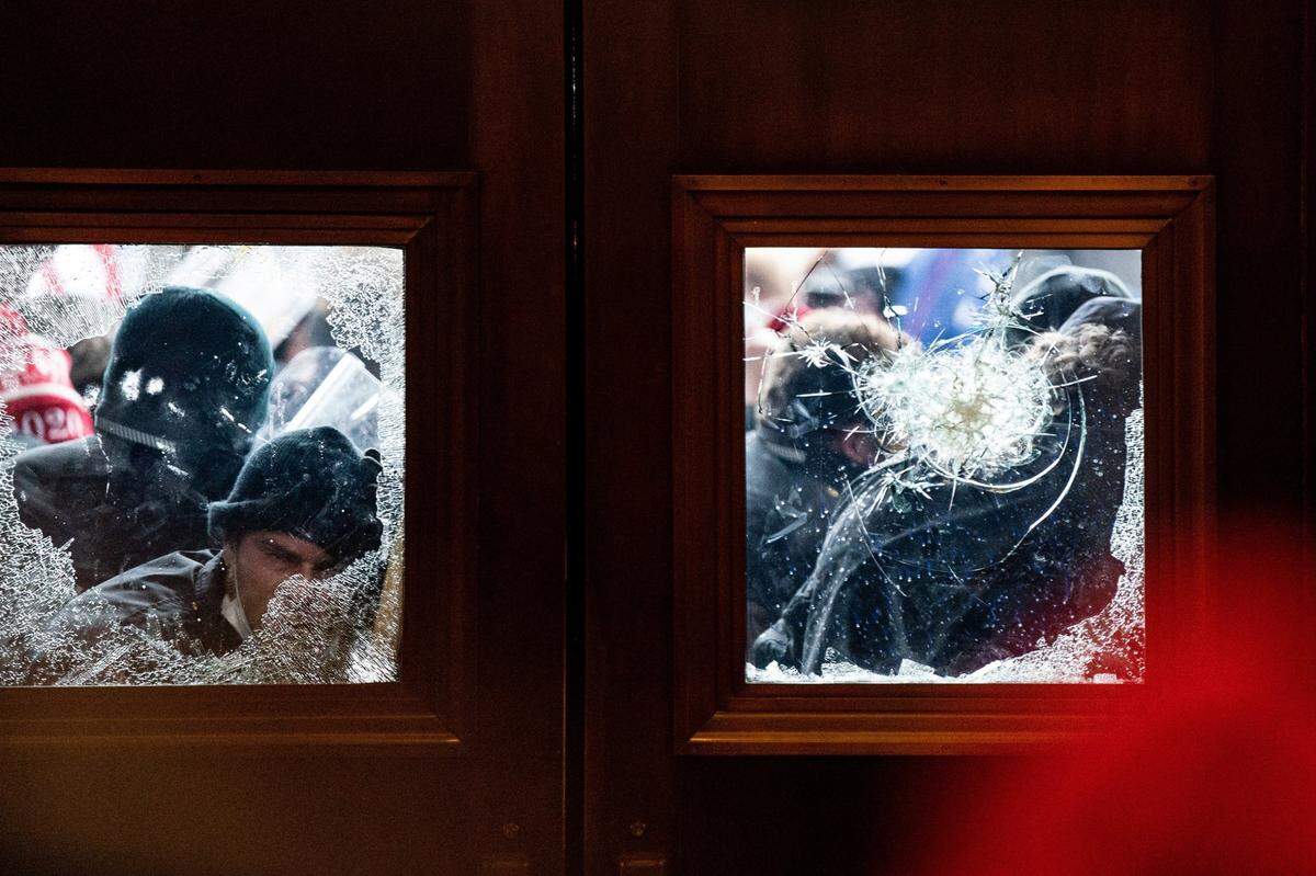 Pro-Trump rioters storm the Capitol in Washington, Wednesday, Jan. 6, 2021, on the same day as a joint session of Congress met to certify the electoral votes from the 2020 presidential election. President Trump’s efforts to overturn the 2020 presidential election came to a dangerous head on Wednesday when a mob of his supporters stormed the Capitol following a rally in which Trump once again falsely claimed widespread voter fraud.