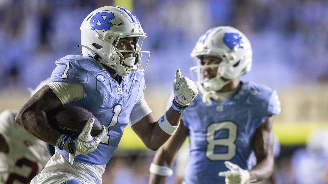 North Carolina receiver Jordan Shipp (1) heads to the end zone for a touchdown on a 55 yards pass play from quarterback Gio Lopez (7) to give the Tar Heels a 20-3 lead over Stanford in the fourth quarter on Saturday, November 8, 2025 at Kenan Stadium in Chapel Hill, N.C.
