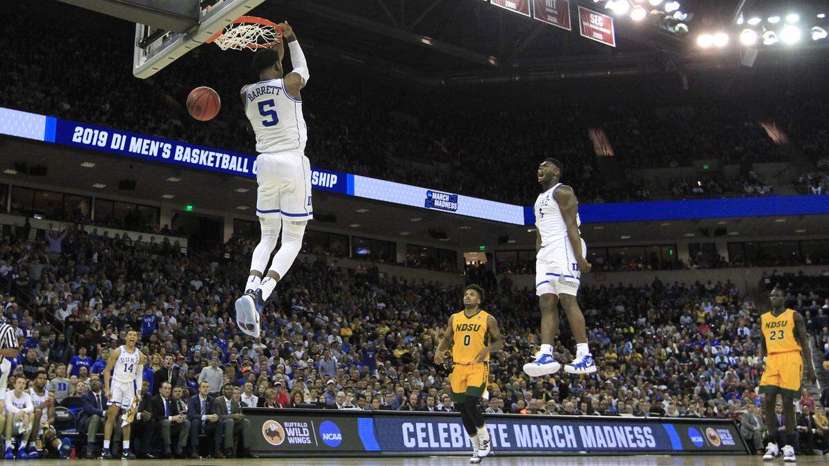 Duke’s Zion Williamson (1), right, celebrates as RJ Barrett (5) slams in two during Duke’s 85-62 victory over North Dakota State in the first round of the NCAA Men’s Basketball Championship in Columbia, S.C., Friday, March 22, 2019.