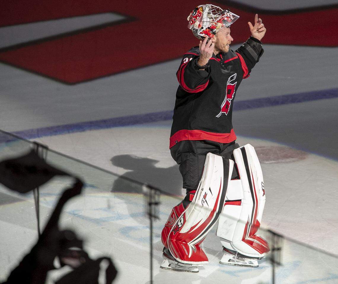 Carolina Hurricanes goalie Antii Raanta (32) acknowledges the crowd as he is honored after making 34 saves in the Hurricanes 5-1 victory over Boston on Tuesday, May 10, 2022 during game five of their Stanley Cup first round series at PNC Arena in Raleigh, N.C.