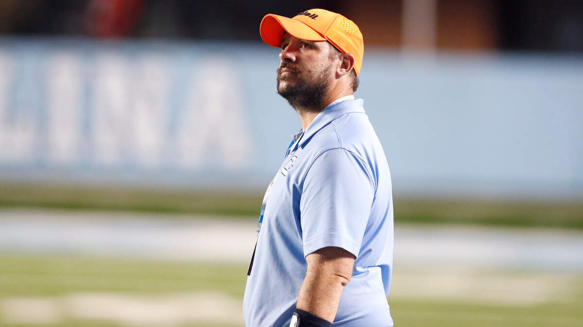Cleveland head coach Scott Riley looks up at the scoreboard in the final seconds of Mt. Tabor High School’s 24-16 victory over Cleveland High School in the NCHSAA 3AA title game at Kenan Stadium in Chapel Hill, N.C., Thursday, May 6, 2021.