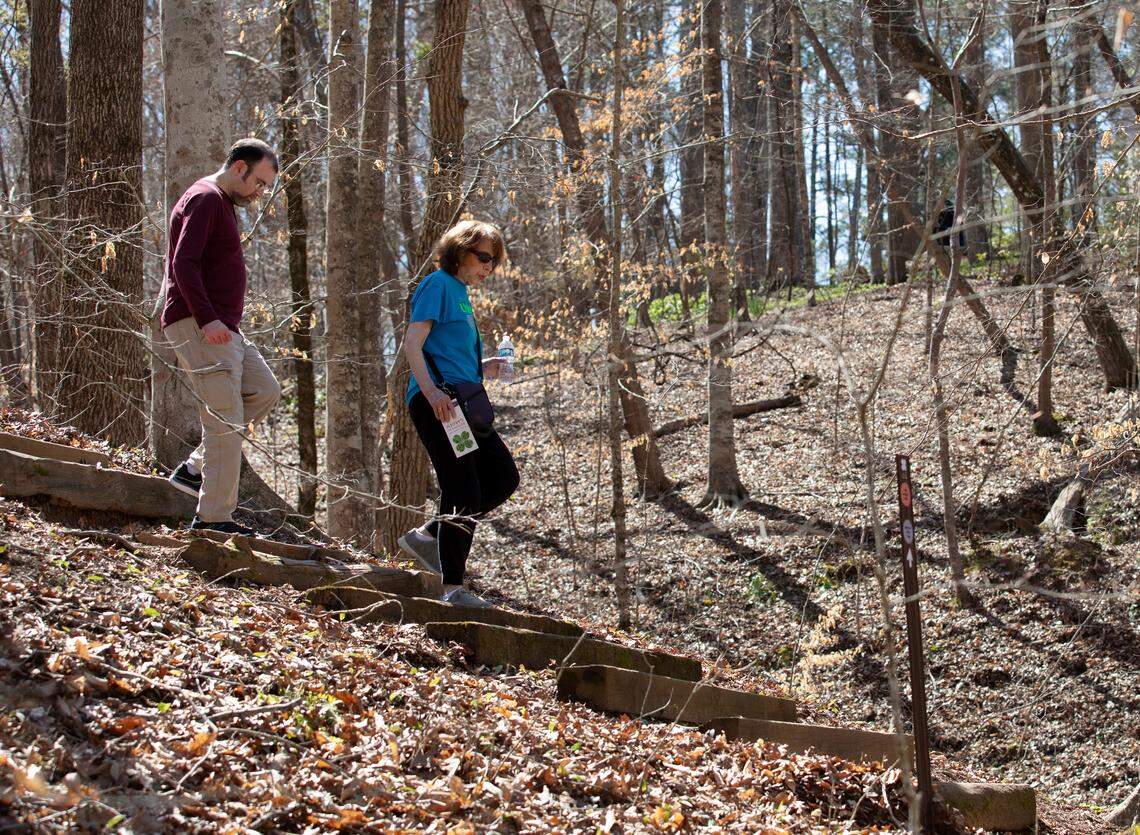 Carol Offen and her son, Paul Offen, walk on a trail in the North Carolina Botanical Garden on Wednesday, March 13, 2024, in Chapel Hill, N.C. Carol, who gave Paul a kidney 17 years ago, now advocates for legislation that would offer better protections for live donors.