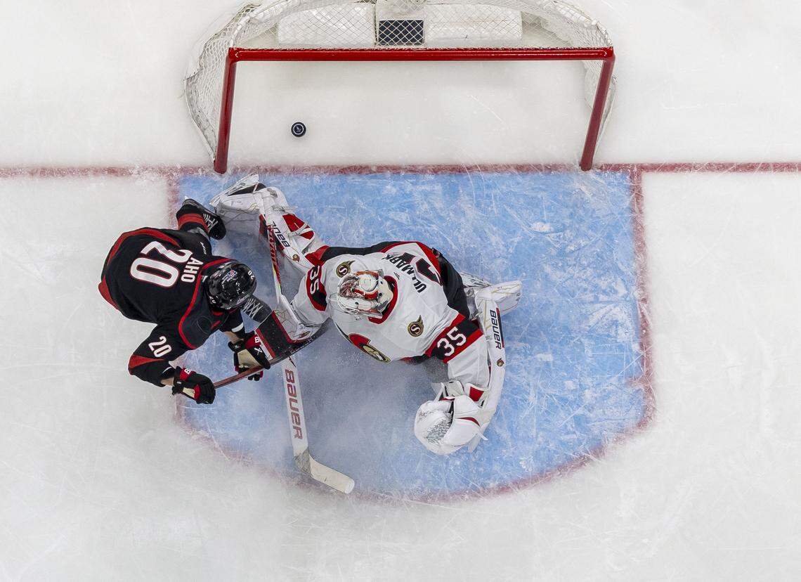 Carolina Hurricanes center Sebastian Aho (20) scores on Ottawa Senators goalie Linus Ullmark (35) to take a 2-0 lead in the second period of Game 2 on Monday, April 20, 2026 during the first round of the Stanley Cup Playoffs at Lenovo Center in Raleigh, N.C. 