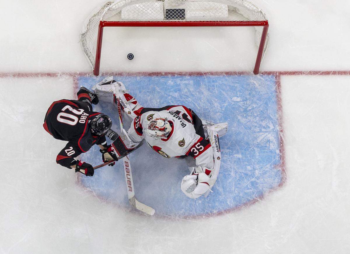 Carolina Hurricanes center Sebastian Aho (20) scores on Ottawa Senators goalie Liunus Ullmark to take a 2-0 lead in the second period of Game 2 on Monday, April 20, 2026, during the first round of the Stanley Cup playoffs at Lenovo Center in Raleigh, North Carolina.